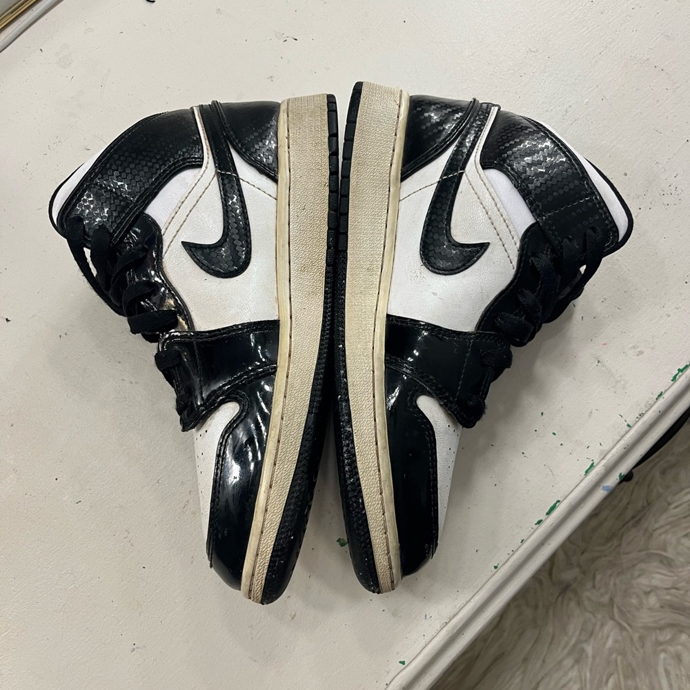 Big kids or woman’s mid Jordan’s